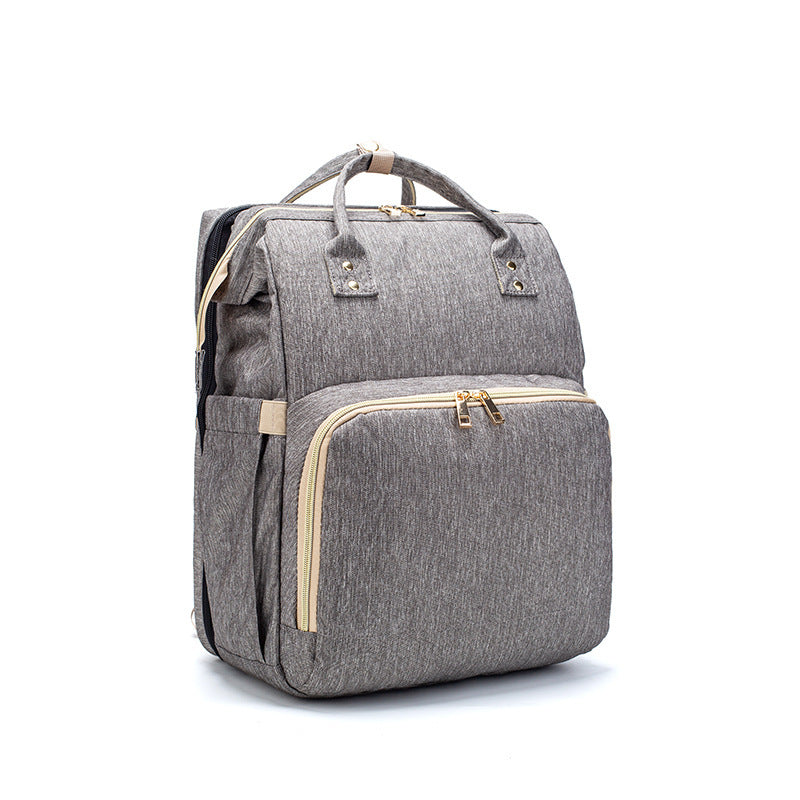 Large Capacity Diaper Bag Backpack with USB Charging and Portable Crib Function β Multi-functional Baby Bag 9
